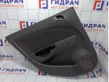 Обшивка двери задней левой Opel Corsa D 7231723