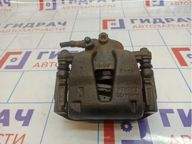 Суппорт тормозной передний правый Opel Corsa D 542404