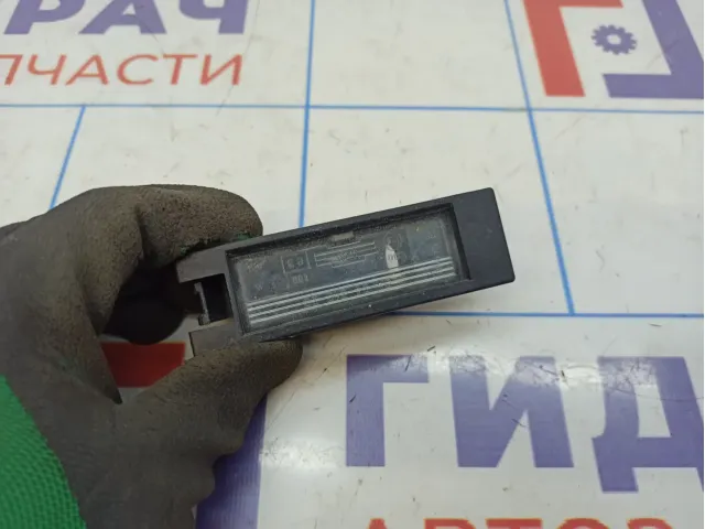 Фонарь подсветки номера Opel Zafira (B) 9164143