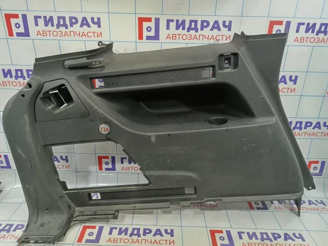 Обшивка багажника левая Opel Zafira B 7336153
