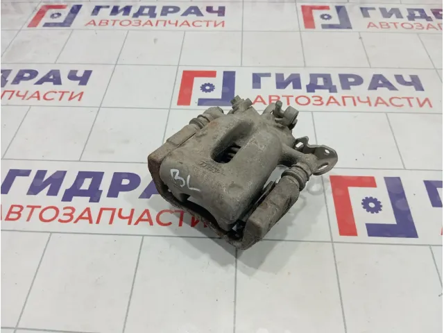 Суппорт тормозной задний левый Opel Zafira 5542451