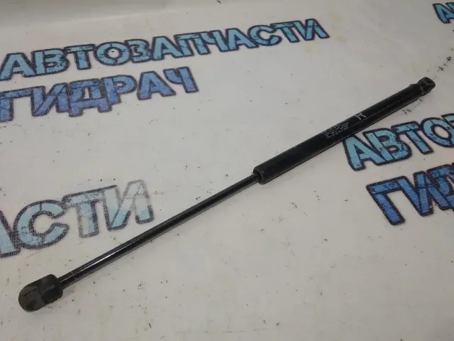 Амортизатор двери багажника Mitsubishi Outlander XL 5802A008. Правый.