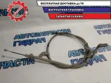 Трос стояночного тормоза левый Kia Rio 3 597601R300.