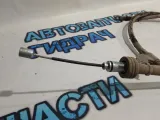 Трос стояночного тормоза левый Kia Rio 3 597601R300.