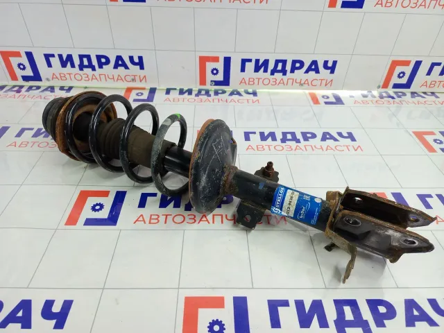 Амортизатор передний в сборе правый Renault Duster 42139938SX