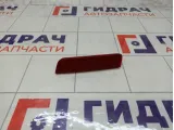 Отражатель в задний бампер правый Renault Duster 265604000R