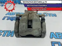 Суппорт тормозной передний левый Renault Duster 7701208332.