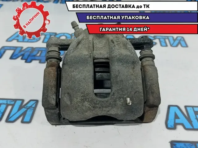 Суппорт тормозной передний правый Renault Duster 7701208333.