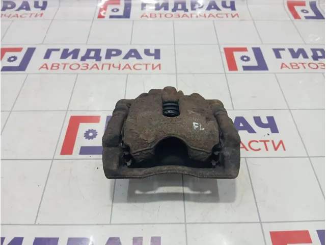 Суппорт тормозной передний левый Renault Duster 7701208332