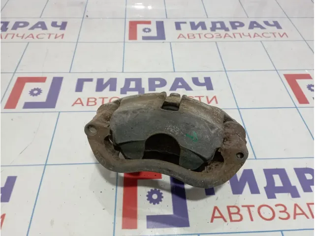 Суппорт тормозной передний правый Renault Kangoo (KC) 7701207787