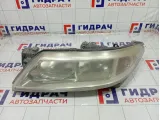 Фара левая Renault Laguna 7701048927