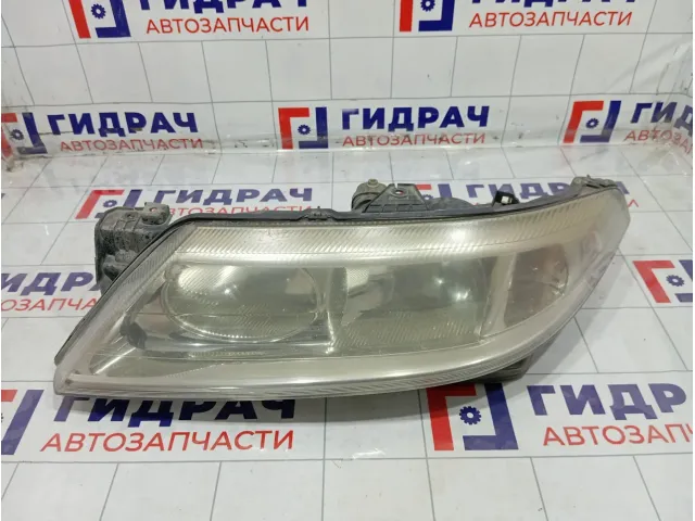 Фара левая Renault Laguna 7701048927