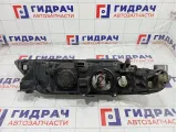 Фара левая Renault Laguna 7701048927