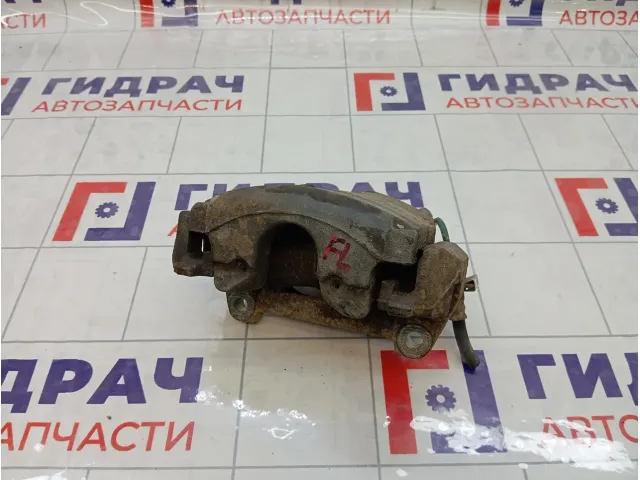 Суппорт тормозной передний левый Renault Laguna 7701049091