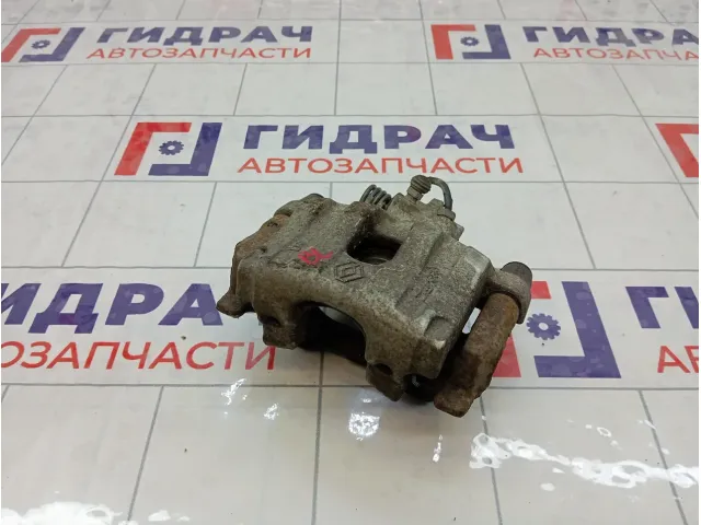 Суппорт тормозной задний левый Renault Laguna 7701049108