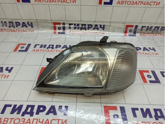 Фара левая Renault Logan 6001546788