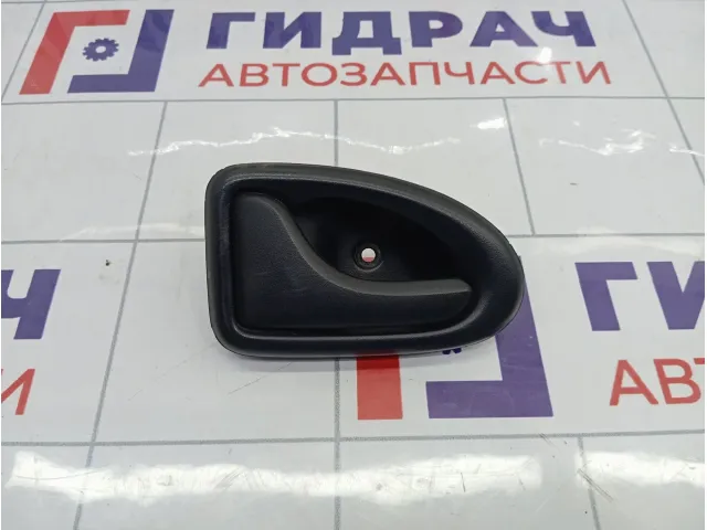 Ручка двери внутренняя левая Renault Logan 7700353282