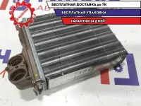 Радиатор отопителя Renault Logan 6001547484.
