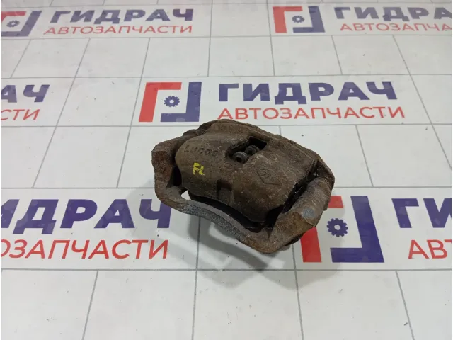 Суппорт тормозной передний левый Renault Logan 7701201769