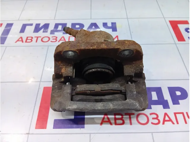 Суппорт тормозной передний левый Renault Logan 7701201769