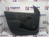 Обшивка двери передней левой Renault Logan 6001551073