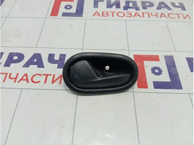 Ручка двери внутренняя левая Renault Logan 806717698R
