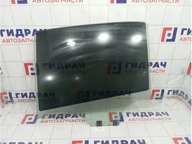 Стекло двери задней левой Renault Logan 823019594R