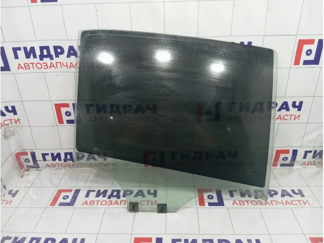 Стекло двери задней правой Renault Logan 823008827R