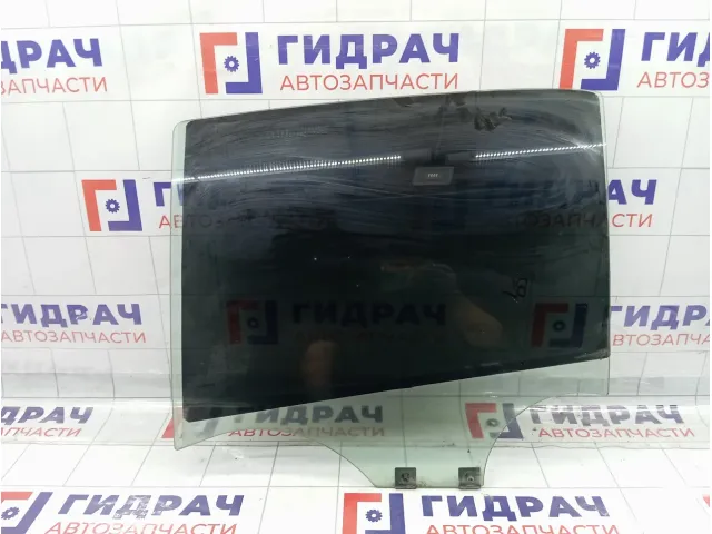 Стекло двери задней левой Renault Logan 823019594R