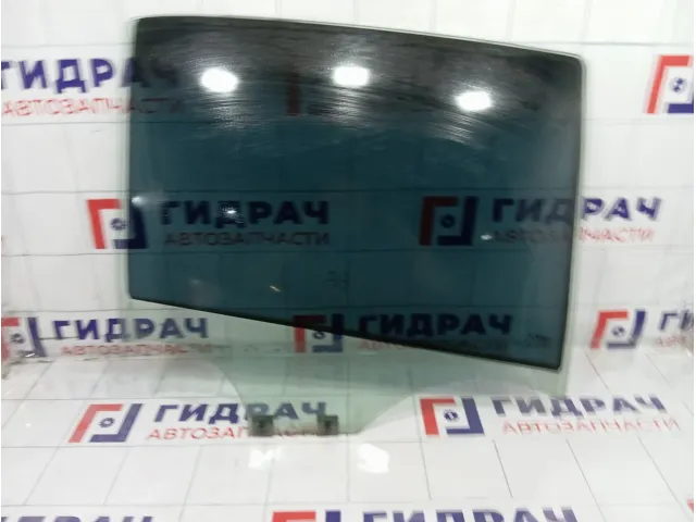 Стекло двери задней правой Renault Logan 823008827R