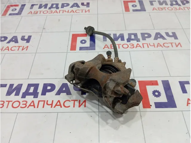 Суппорт тормозной передний правый Renault Logan 410010121R