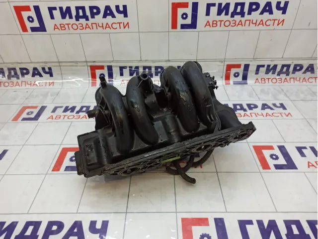 Коллектор впускной Renault Logan 140035357R