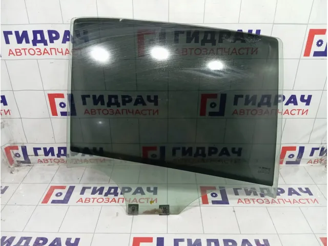 Стекло двери задней правой Renault Logan 823008827R