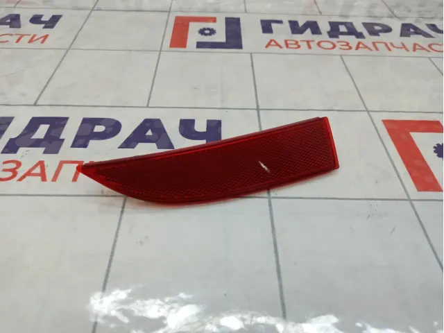 Отражатель в бампер задний правый Renault Logan 2 265600427R
