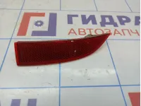 Отражатель в бампер задний левый Renault Logan 2 265659019R.