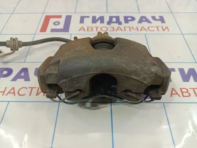 Суппорт тормозной передний правый Renault Megane 2 7701065267