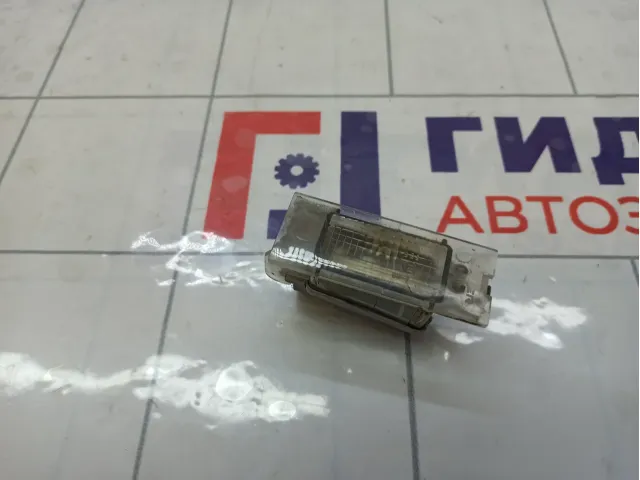 Фонарь подсветки номера Renault Megane 7700796163