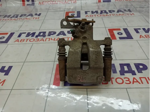 Суппорт тормозной задний левый Renault Megane 7701207693