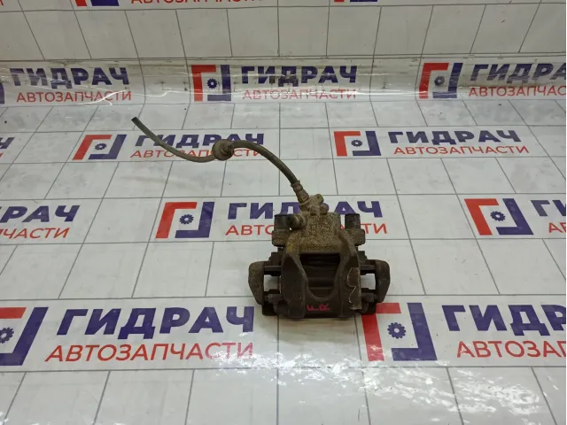 Суппорт тормозной передний правый Renault Sandero 410010121R