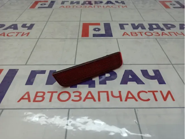 Отражатель в задний бампер левый Renault Sandero 265654344R