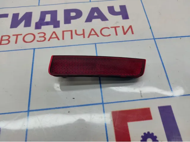 Отражатель в бампер задний правый Renault Sandero Stepway (5S) 265604000R