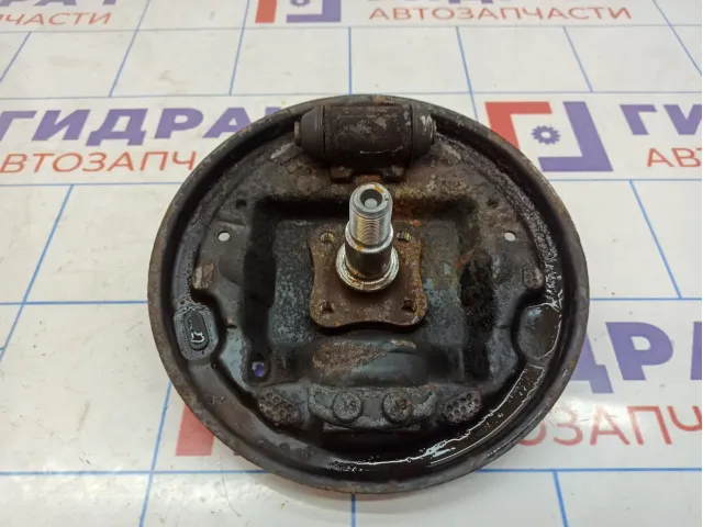 Щит опорный задний левый Renault Symbol (LB) 7701051518