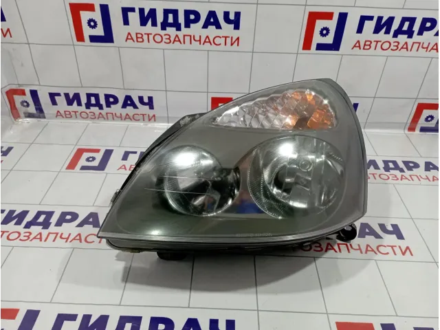 Фара левая Renault Symbol (LB) 7701057654