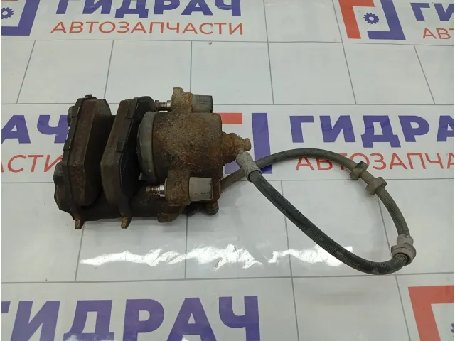 Суппорт тормозной передний правый Skoda Fabia 1K0615124D