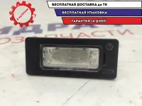 Фонарь подсветки номера Skoda Fabia 8T0943021.