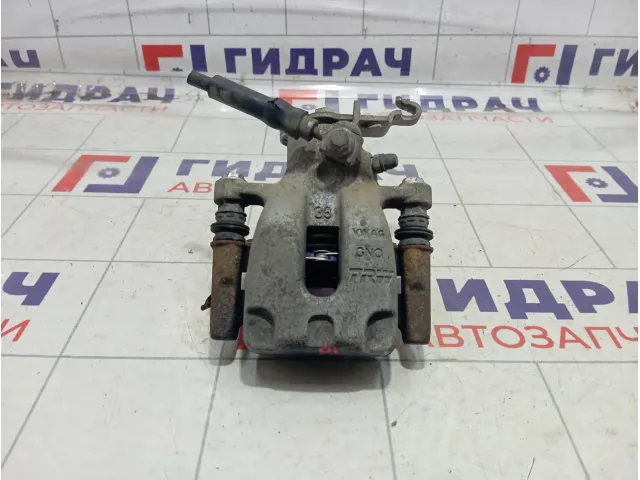 Суппорт тормозной задний левый Skoda Octavia (A7) 5Q0615423A