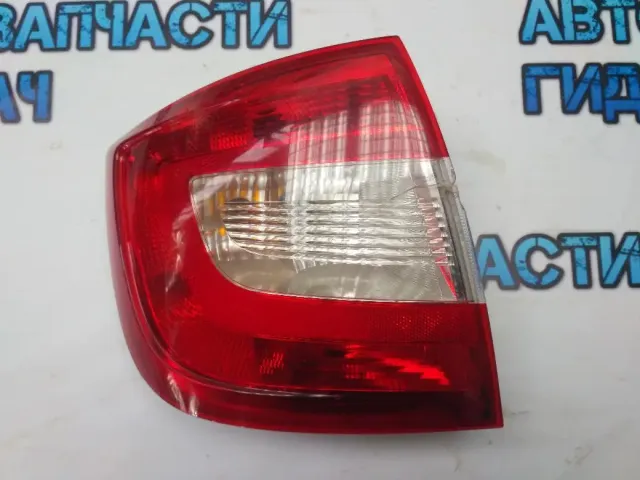 Фонарь задний левый Skoda Rapid 5JH945111 Удовлетворительное состояние Дефект, трещина.
