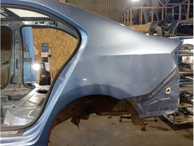 Крыло заднее левое Skoda Rapid (NH3)