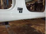 Порог со стойкой правый Skoda Rapid (NH3) . Вмятина.