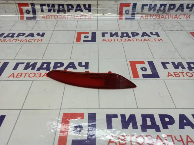 Отражатель в задний бампер правый Skoda Yeti 5L0945106